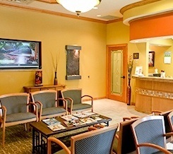 orange and green waiting room in dental office