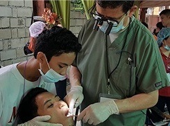 dentist working on mission trip